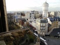 View of the Parisian district of Montmartre with gothic chimera from the windows of The Basilica of SacrÃÂ© Coeur de Montmartre