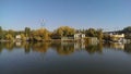 view of the park and the horse ride from the back of the river Royalty Free Stock Photo