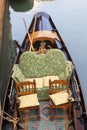 View on parked gondola, inside, space for passengers, Venice, Italy