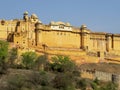 View of part of the fortress walls and towers of the ancient fort Amber. Jaipur, India