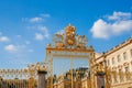 View of the part of a north wing of the Palace of Versailles across his gilding fence Royalty Free Stock Photo