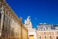 View of the part of a north wing of the Palace of Versailles across his gilding fence