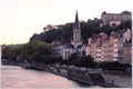 View on the part of the Old Lyon, aka Vieux Lyon quarter with the church of Saint George on sunset Royalty Free Stock Photo