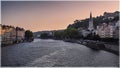 View on the part of the Old Lyon, aka Vieux Lyon quarter with the church of Saint George on sunset Royalty Free Stock Photo