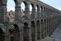 View of part of the stone arched double-tiered aqueduct in Segovia, Spain