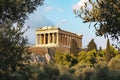 A View of the Parthenon in Athens, A classical Greek Parthenon surrounded by olive trees, AI Generated