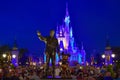 View of Partners Statue This statue of Walt Disney and Mickey Mouse  is positioned in front of illuminated Cinderella Castle in Ma Royalty Free Stock Photo