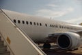 View of passenger aircraft body with windows and airstay from outside on a daytime Royalty Free Stock Photo