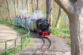 View from a passenger train with steam locomotive of Miniature Park Railroad