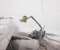 View from passenger window of de-icing of aircraft wing