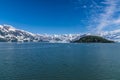 A view past Haenke Island towards the glaciers of Disenchartment Bay in Alaska