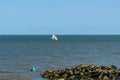 A view past sea defenses out to sea at Clacton on Sea, UK Royalty Free Stock Photo