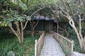 View of path with wooden fence and cute house in the jungle Royalty Free Stock Photo