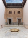 View at the Patio entrance hall to the Nasrid Palaces on fortress complex of the Alhambra citadel, tourist people visiting Royalty Free Stock Photo