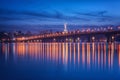 View of the Paton bridge, Motherland monument and Dnieper river at night, beautiful cityscape, Kiev, Ukraine