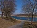 View of paved footpath on Danube Island (Donauinsel), an artificial island in the center of Vienna, Austria.