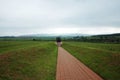 PATH APPROACHING THE NELSON MANDELA IRON COLUMN STATUE IN HOWICK