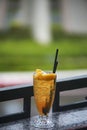 A view of a peach green tea beverage.