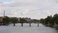 View of pedestrian bridge Pont des Arts connecting the two sides of Seine river in the historic center of Paris, France. Royalty Free Stock Photo