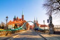 View of the pedestrian Tumski Bridge is also called Lovers Bridge, Cathedral Bridge or Green Bridge, adorned with many love lock Royalty Free Stock Photo