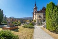 View of Peles Castle from the side of the monument to Queen Elizabeth, Romania Royalty Free Stock Photo