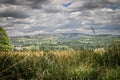 A view of Pendle Hill and gathering rain clouds.