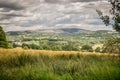 A view of Pendle Hill and gathering rain clouds.