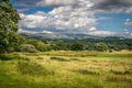 A view of Pendle Hill and gathering rain clouds.