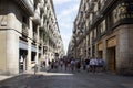 View of people walking on one of the narrow shopping streets