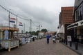 View of people walking at the pier in Volendam.