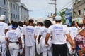 View of people wearing white shirts while holding posters on Bahia's Independence Day