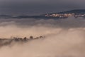 A view of Perugia city Umbria, Italy above a sea of fog