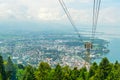 View of a pfanderbahn cable car with the Austrian city Bregenz behind it....IMAGE Royalty Free Stock Photo