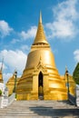 View of gold stupa near Temple of Emerald Buddha in Bangkok Royalty Free Stock Photo