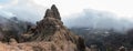 Panoramic view of `Pico de las Nieves`, near Tejeda surrounded by clouds on the island of Gran Canaria Royalty Free Stock Photo