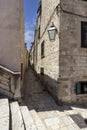 View of picturesque narrow street next baroque Jesuit Stairs, Dubrovnik Croatia Royalty Free Stock Photo