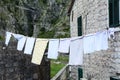 View of picturesque old street in Kotor with airing clothes. Old town of Kotor, Montenegro