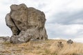 View on Pidkamin inselberg on adjacent hill and nearby ancient graveyard in Brody region of Galychyna