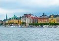 View on the pier with boats and beautiful buildings of Stromkayen in the center of Stockholm Sweden Royalty Free Stock Photo