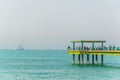 view of a pier penetrating into the sea behind the Sharq souq in Kuwait