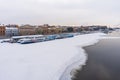 St. Petersburg, Russia, February 10, 2024. View of the Neva River embankment with a parking lot for motor ships. Royalty Free Stock Photo