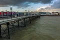 A view from the pier towards the town of Worthing, Sussex, UK at sunset Royalty Free Stock Photo