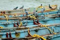 View of pigeons sitting on old rusty boats