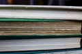 View on  pile of antique yellowed books with edges of cover and textblock Royalty Free Stock Photo