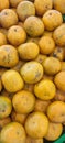 View of pile of oranges being sold in market place, top view of sunkist oranges, yellow round fruits, fresh fruit background Royalty Free Stock Photo