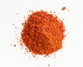 View of pile of paprika powder close up on gray Royalty Free Stock Photo