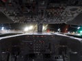 View through pilot cabin to the airfield at night Royalty Free Stock Photo