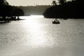 View of the Pituacu park lagoon with tourists using duck-shaped boats. City of Salvador, Bahia