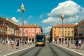 View of Place Massena with walking people and modern tram in Nice, France. Royalty Free Stock Photo
