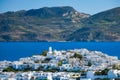 View of Plaka village with traditional Greek church. Milos island, Greece Royalty Free Stock Photo